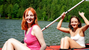 Pale redhead and her partner enjoying the spring day