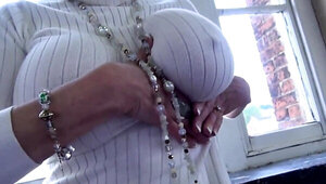 MILF Lady Sonia playing with her tits and shows off