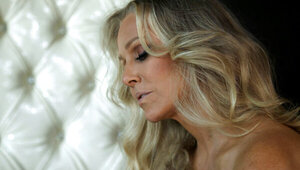 Julia Ann shows her young stepdaughter how to eat pussy