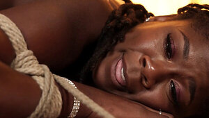 Amazing tied-up ebony chick gets fucked in doggy style