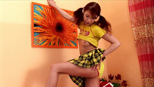 Naughty schoolgirl gets horny and masturbates for the camera