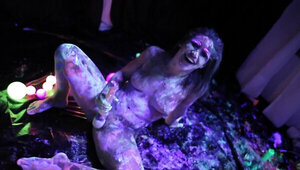 Black light and body paint makes for a wild lesbian orgy