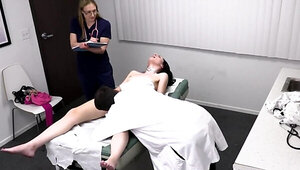 Naughty doctor and a nurse are having fun with brunette patient