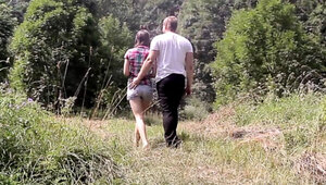 This romantic couple is having hardcore sex in nature