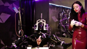 Mistress Lady Ashley tortures slave's cock and balls in dungeon