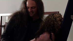 Redhead babe gets fucked in the face in BDSM sex dungeon