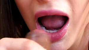 Lana Rhodes filmed in a close angle while giving a BJ
