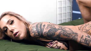 Tattooed blonde bombshell gets poked with a hard cock