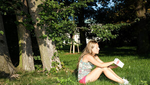 Cute blonde with natural breasts gets wet in the field