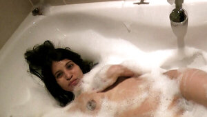 Desi babe with nice natural boobs is enjoying the bathtub