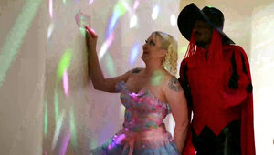 Black stud celebrating Halloween with a busty blonde