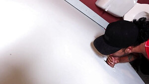 Riley Mitchel goes to the gloryhole to play with a big cock