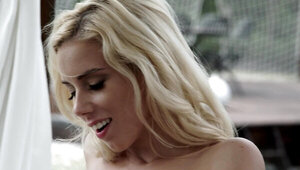 Sweet blonde is out in the sun, handling a big hard erection