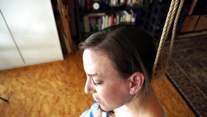 Solo masturbation scene showing a choking solo slut