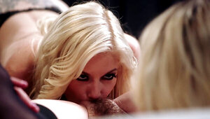 Blonde's tongue flicked against the excited clit of a hairy pussy