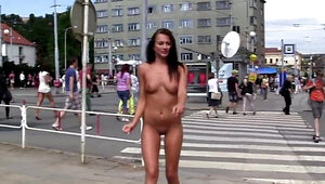 Kinky exhibitionist poses all naked in public