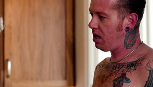 Busty blonde is playing with a cock inside the kitchen