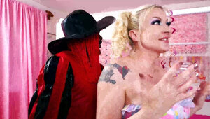 Black stud celebrating Halloween with a busty blonde