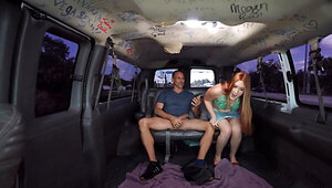 Redhead girl sucks a hard cock in a porn casting van