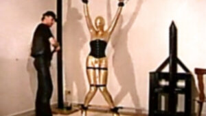 Restrain bondage in gold catsuit