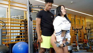 Thick Latina bangs black fitness instructor in a gym