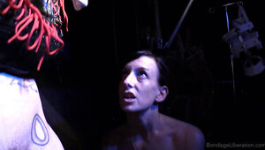 Girl is tied up and tortured by a perverted brunette mistress