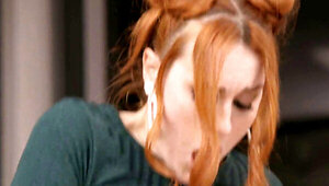 Redhead bombshell blows and rides a guy in the gym