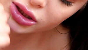 Lana Rhodes filmed in a close angle while giving a BJ