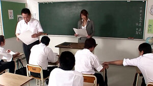 Asian teacher is going on her knees for a blowjob