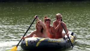 In a boat where they are having a wild summer adventure