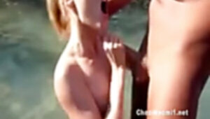 Public deep throat on naked beach part1