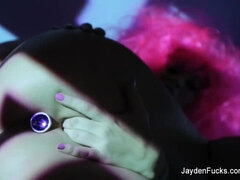 Busty Jayden Jaymes teases the camera with a buttplug