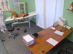 Young patient spreads her legs for doctor