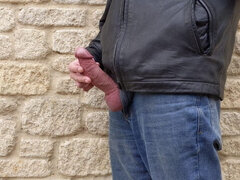 Outdoor masturbating and cumming wearing leather jacket and jeans