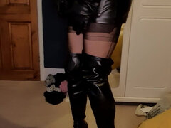 Dressed up in a tight leather mini skirt and slipping into my thigh high leather boots Let me know if you have a boot fetish