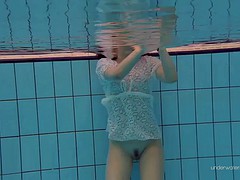 hot soroka takes her short dress underwater revealing her nude body