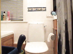 Teenager nymph on the toilet