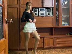 Heather Takes off Skirt to Model Tan Pantyhose
