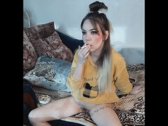 Stepsister without panties smokes a cigarette