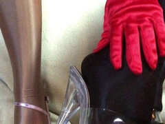 Sensual Teasing Close up Legs and Feet in Shiny Glossy Pantyhose and High Heels.