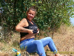 Pee in a corn field - Crossing her legs to calm her full bladder and wet her jeans in the heat outdoor