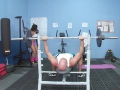 Slender brunette is fucking her personal trainer