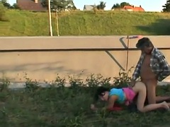 Teen fucked outdoors as traffic passes