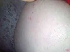 ass on fire by a candle light