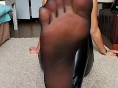 Miss Alices sexy nylon feet in leather leggings