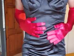 Red satin gloves ?and tight black satin dress