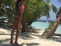 Tanned Katty West in the Maldives