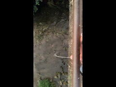 Twink Piss From the Bridge Into the River
