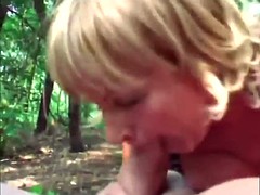 a nasty blonde granny rubs her pussy in the forest and gets pssy fucked hard