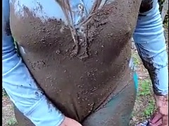 Sexy Crossdresser outside in a muddy mess. I masturbate my big cock and cum in mud, nylon pantyhose and leotard